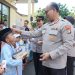 Polres Jakut Beri Santunan & Makan Siang Gratis Anak Yatim
