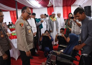 Buka Puasa Bersama Ulama dan OKP, Polrestabes Medan Serahkan Kursi Roda